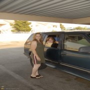 This mature slut gets fisted in a driving car